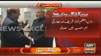 Nawaz Sharif handshakes with Modi in Paris - See the Expressions of Modi