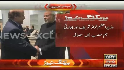 Nawaz Sharif handshakes with Modi in Paris
