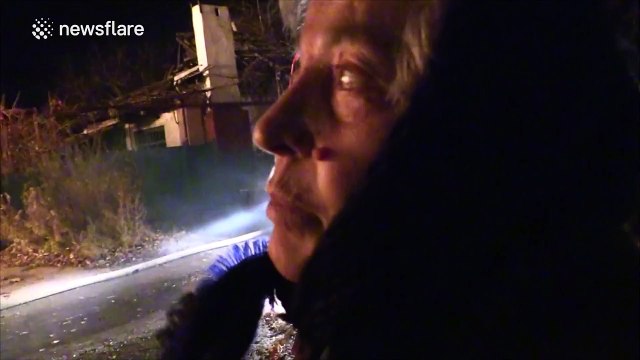 Homes burn after shelling as fighting intensifies on the outskirts of Donetsk, Ukraine