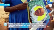 Pope Francis visits mosque in war-torn Bangui, calling for end to the conflict there