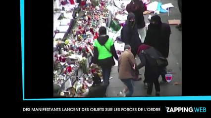 COP21 : Des manifestants jettent des bougies déposées pour les victimes des attentats de Paris sur les policiers (vidéo)