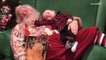 Santa takes a nap with a sleeping baby and the picture goes viral