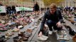Climate activists display shoes in silent protest