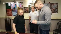 Magician performs incredible card trick by switching cards from mouth-to-mouth