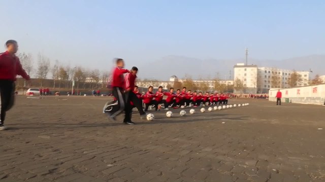 Shaolin Students Train for Kung Fu Soccer at the Shaolin Football Academy