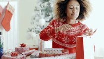 Pretty Young Woman Wrapping Xmas Presents | Stock Footage - Videohive