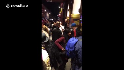 Spontaneous street dancing outside London Palladium, UK