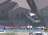 Driver crashes stolen car into Phoenix home