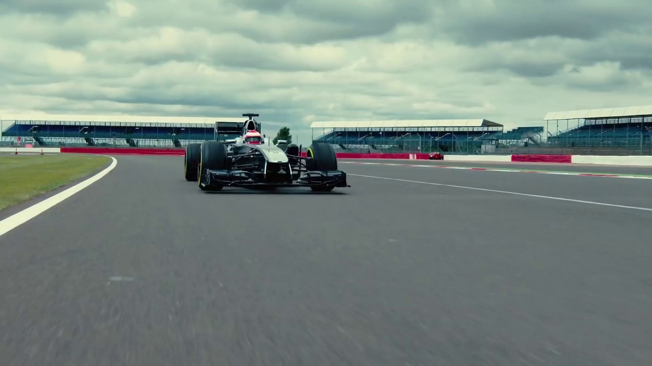 J.Button know how to drive his F1 Car between concrete Barriers