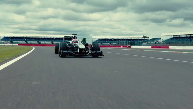 J.Button know how to drive his F1 Car between concrete Barriers