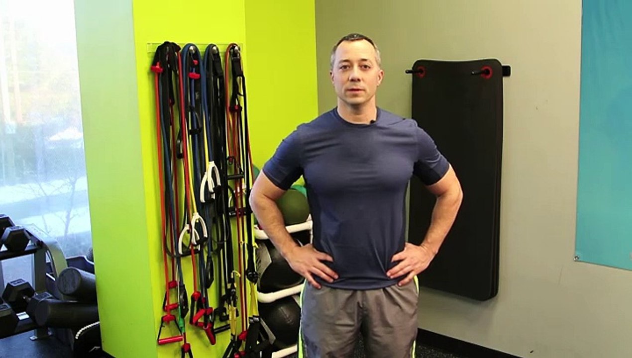 Exercises With Hand Weights to Strengthen the Neck & Shoulder Muscles