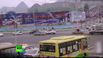 CCTV_ Truck tips over _ rams into traffic in China 2015