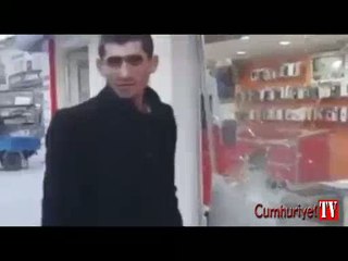 Putin'e meydan okuyan esnafın camını indirdiler