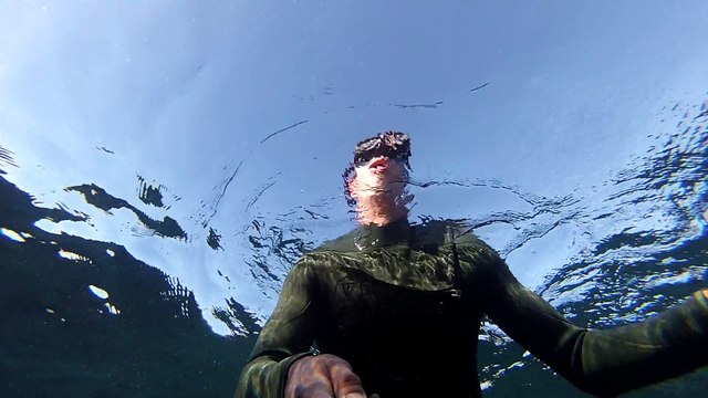 Nearly getting stuck while diving caves in Laguna Beach