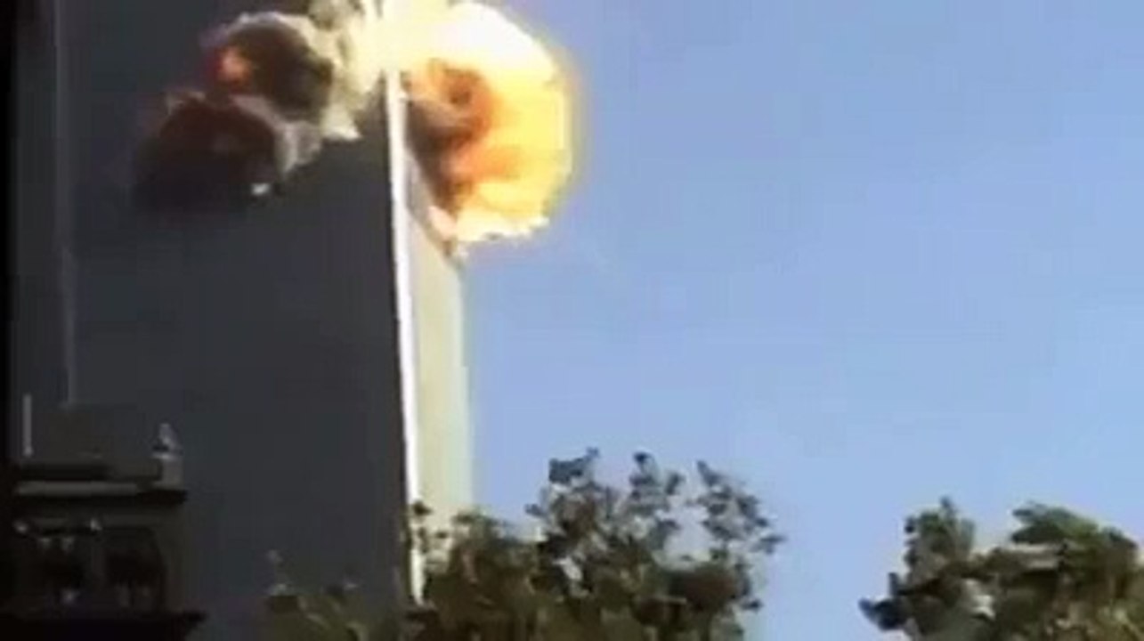 9 /11 Video is Fake Proof is Here, See the Plane Wing Behind the Building