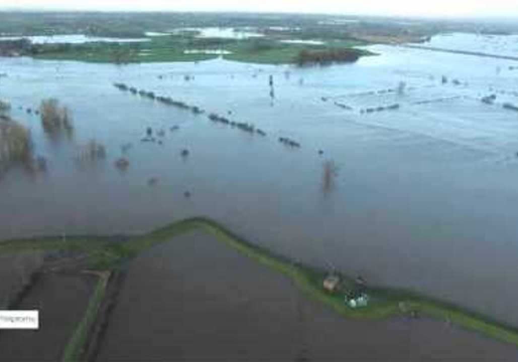 Footage Shows Large Buildings Submerged in Cumbria Floods