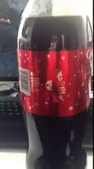 Awesome Coca-Cola Christmas bottle bowtie