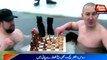 Russian ice swimmers play chess in Cold water