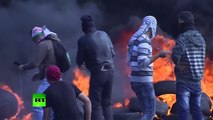 Burning tires, tear gas & stones: Palestinian youths clash with Israeli forces