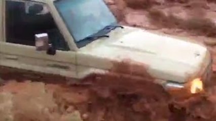 Driver Stuck in Flash Flood