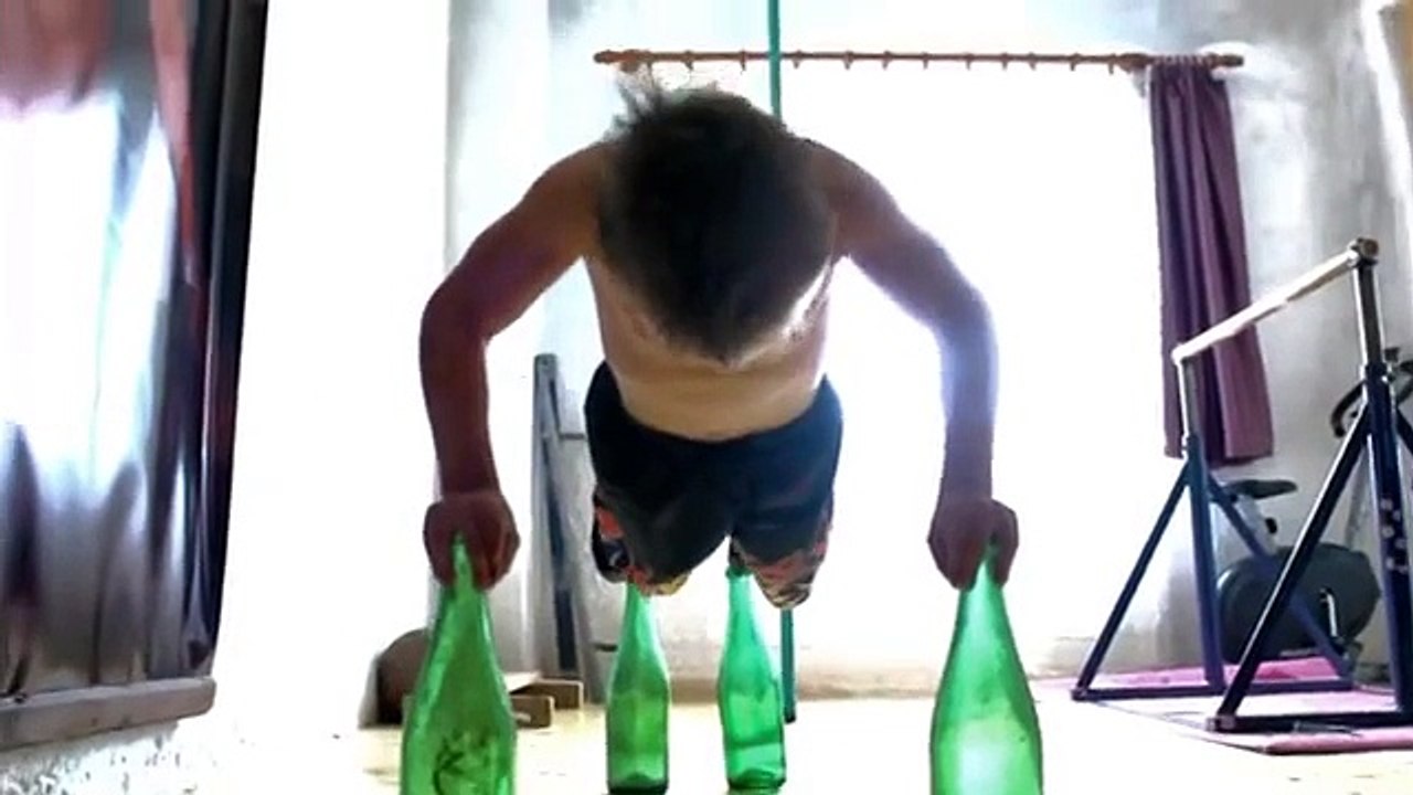 Giuliano pushups on the bottle