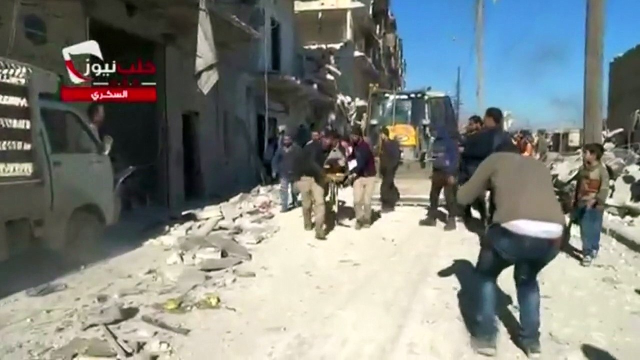 Children pulled from rubble after airstrikes in Syria