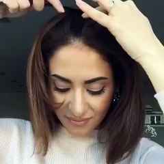 A classy low ponytail with a touch of a fishtail braid