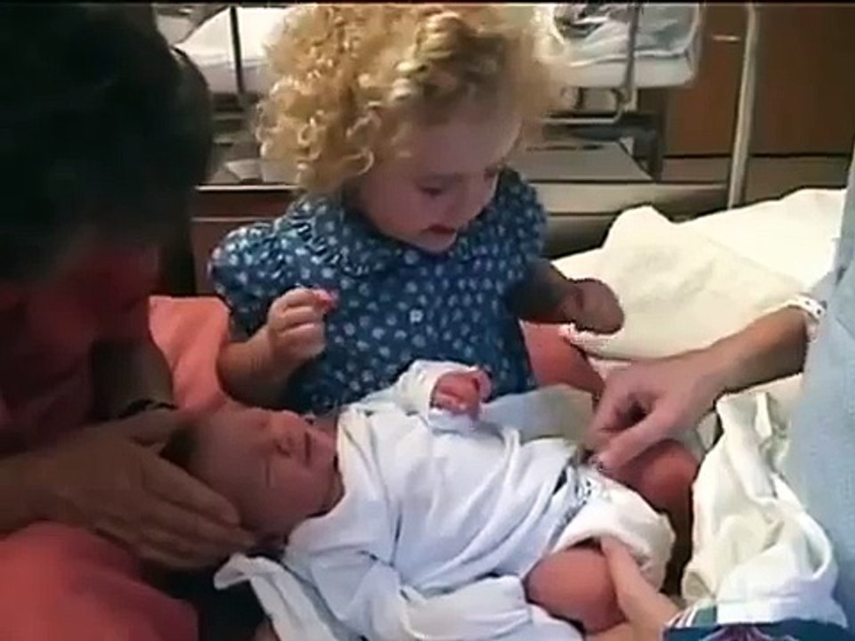 Darling Girl Calms Newborn Sister by Doing the Sweetest Thing
