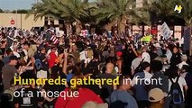 Carrying guns and swearing- this is how demonstrators gathered in front of a mosque in Arizona.