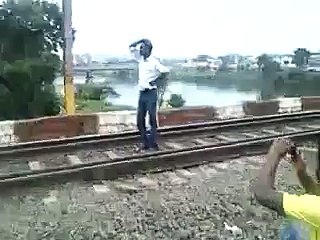 TRAIN IS GOING OVER INSANE MAN
