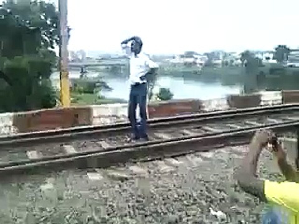 TRAIN IS GOING OVER INSANE MAN