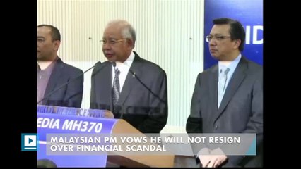 Malaysian PM vows he will not resign over financial scandal