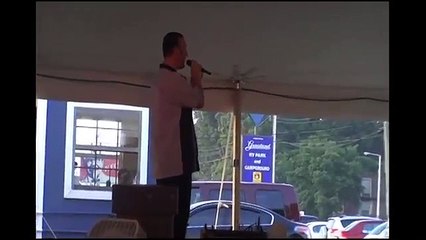 Scott Michael sings 'Long Black Limousine' at the tent Elvis Week