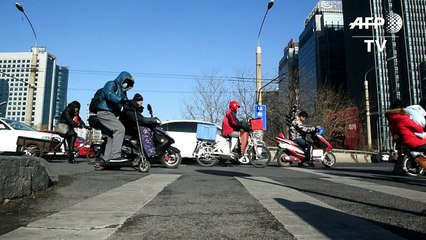 Pequim suspende alerta vermelho por poluição