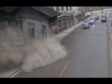 CCTV: Landslide causing house crash onto road in China