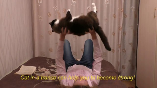 Russian Girl makes her Cat does everything she wants! So funny!