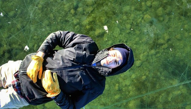 Cold temperatures, winds, freeze Canadian lake clear