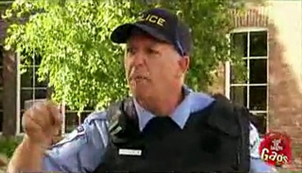 policeman_loses_pen_behind_ear_download_funny_prank