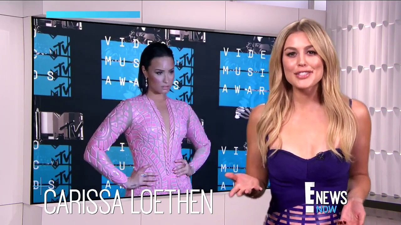 Demi Lovato Ditches Her Bra in Hot Suit