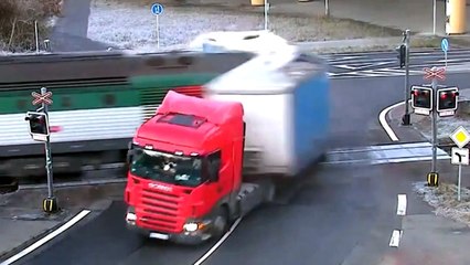 Semi Truck Crosses In Front of Train and Pays The Price