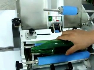 Máy dán nhãn keo, hồ chai tròn bán tự động L117