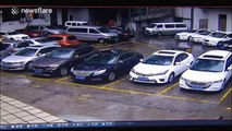 Wall collapses and damages eight cars in a parking lot