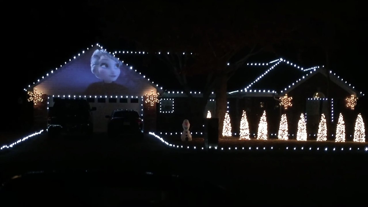 House is lighted by "Frozen" Christmas Lights with the Film!