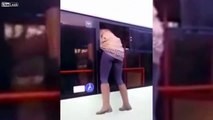 LiveLeak.com - Woman escapes through bus window to avoid paying ticket fine and leaves handbag inside