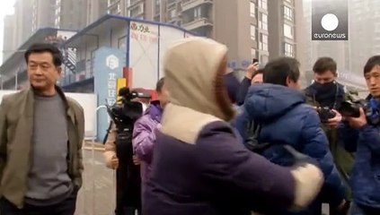 El juicio contra el abogado chino de los derechos humanos queda visto para sentencia entre protestas reprimidas por la policía