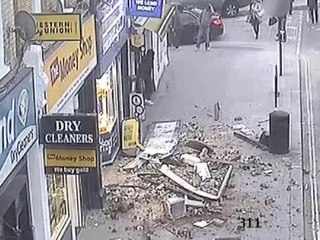CCTV captures roof collapse on busy London street