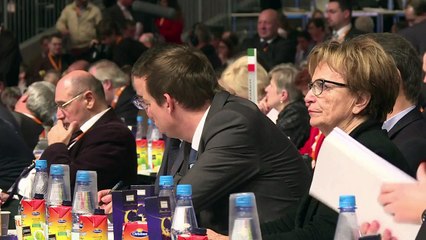 Merkel promete reduzir número de refugiados