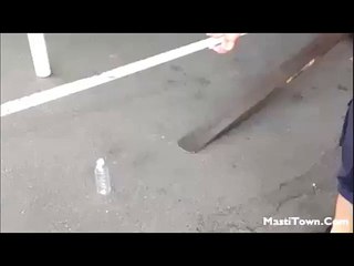 Coin Placed on Bottle Neck by fork lift truck - Amazing Talent