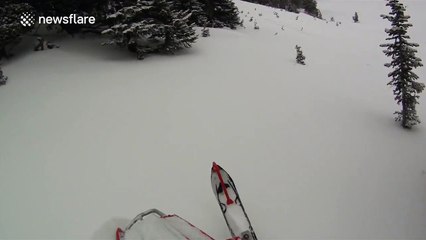 Man sent flying off snowmobile after hitting rock