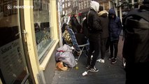 Kanye sneaker fans wait for the Yeezy Boost 750 black in Amsterdam